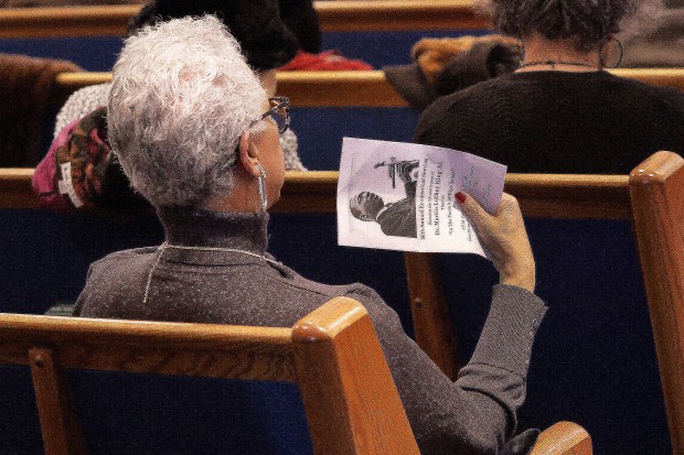 A church member sings along with the choir during the 56th Annual Dr. Martin Luther King Day Celebration at New Mount Moriah Missionary Baptist Church in Gary on Jan. 19, 2025. (John Smierciak / Post-Tribune)