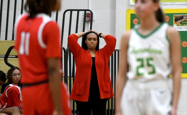 East Chicago Central coach Lani LeMea Edmonds watches the action during their game at Morgan Township High School in Valparaiso, Indiana Wednesday Nov. 20, 2024. Morgan Township won 47-46.(Andy Lavalley/for the Post-Tribune)