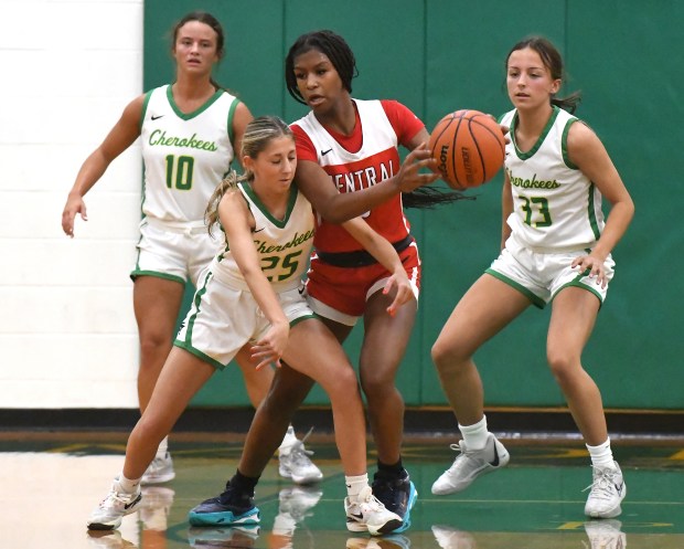 Morgan Township's Isabella Bryan fouls East Chicago Central's Lela Edmonds during their game at Morgan Township High School in Valparaiso, Indiana Wednesday Nov. 20, 2024. Morgan Township won 47-46.(Andy Lavalley/for the Post-Tribune)