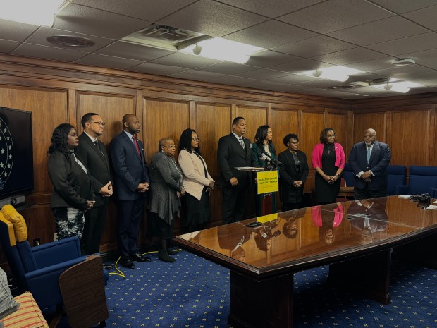 Chair of the Indiana Black Legislative Caucus State Rep. Earl Harris Jr., D-East Chicago, center, State. Rep. Carolyn Jackson, D-Hammond, left of Harris, during a Jan. 14, 2025, news conference announcing the Indiana Black Legislative Caucus agenda for the 2025 session. (Indiana Black Legislative Caucus/provided)