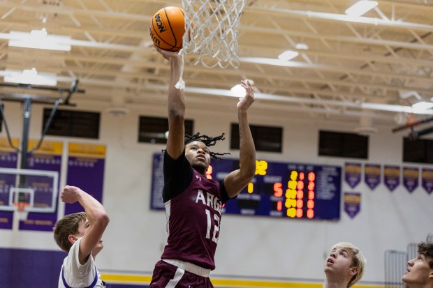 Argo's Darron Greer Jr. (12) puts up a shot against Chicago Christian during a nonconference game in Palos Heights on Wednesday, Jan. 29, 2025. (Vincent D. Johnson / for the Daily Southtown)