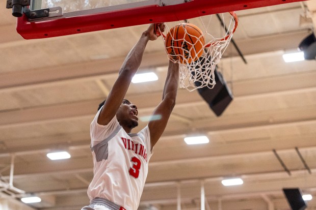 Homewood-Flossmoor's Arden Eaves dunks the ball against Lincoln-Way West during a Southwest Suburban Conference game in Flossmoor on Friday, Jan. 17, 2025. (Vincent D. Johnson / for the Daily Southtown)