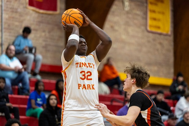 Tinley Park's Kendall Webb (32) puts up a shot against Tinley Park during a South Suburban Conference crossover game in Tinley Park on Wednesday, Jan. 22, 2025. (Vincent D. Johnson / for the Daily Southtown)