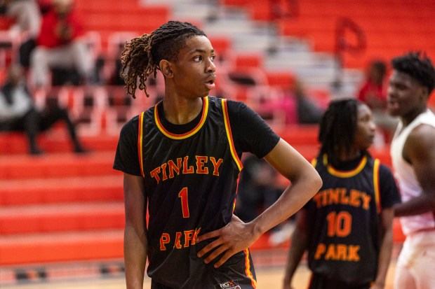 Tinley Park's Daniel Jervier (1) looks back to see where the Eisenhower players are before an inbound pass during a South Suburban Conference game in Blue Island on Monday, Jan. 13, 2025. (Vincent D. Johnson / for the Daily Southtown)