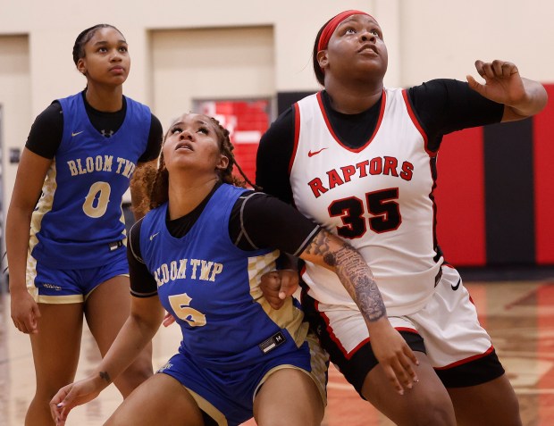 Bloom's Jayla Tyler (5) and Rich Township's Kamari Beatty (35) battle for a rebound during a basketball game on Monday, Jan. 27, 2025. (John Smierciak / Daily Southtown)