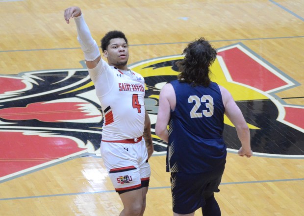 St. Xavier's Davion Lawrence hits an early 3-point basket against Judson in a CCAC game in Chicago on Wednesday, Jan. 22, 2025. (Jeff Vorva / Daily Southtown)