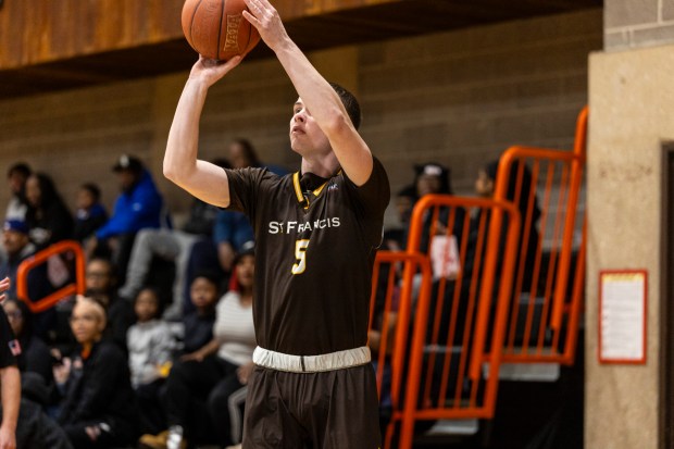 University of St. Francis' Nick Diego (5) takes a three point shot against Governors State University during a Chicagoland Collegiate Athletic Conference game in University Park on Wednesday, Jan. 8, 2025. (Vincent D. Johnson / for the Daily Southtown)