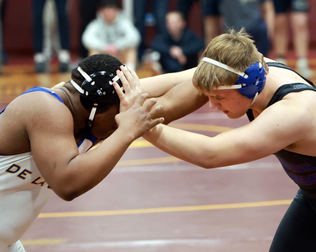 (285) Mateusz Nycz of Marmion Academy, right, and David McCarthy of De La Salle, left, during the 2025 Chicago Catholic League Championship wrestling tournament held at Montini Catholic High School in Lombard on Saturday, Jan. 25, 2025. (James C. Svehla / for the Daily Southtown)