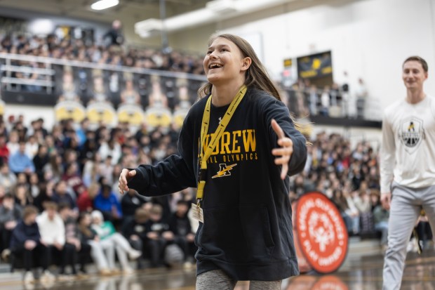 Andrew junior Mary Elmore participates in a shooting contest Friday after her school was named a National Unified Champion Banner School by Special Olympics North America. (Troy Stolt/for the Daily Southtown)