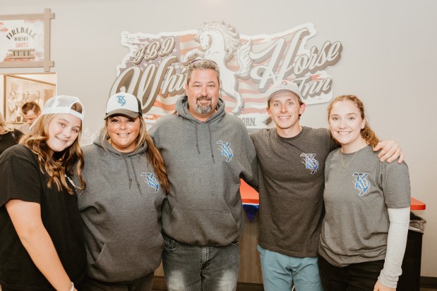 Tyler Koscinski's family members, Alyssa Kocsinski, from left, Kelly Koscinski, Chris Koscinski, Connor Lowman and Sarah Lowman at the inaugural fundraiser at the White Horse Inn Oct. 26, 2024. (Courtney Ann Photography)