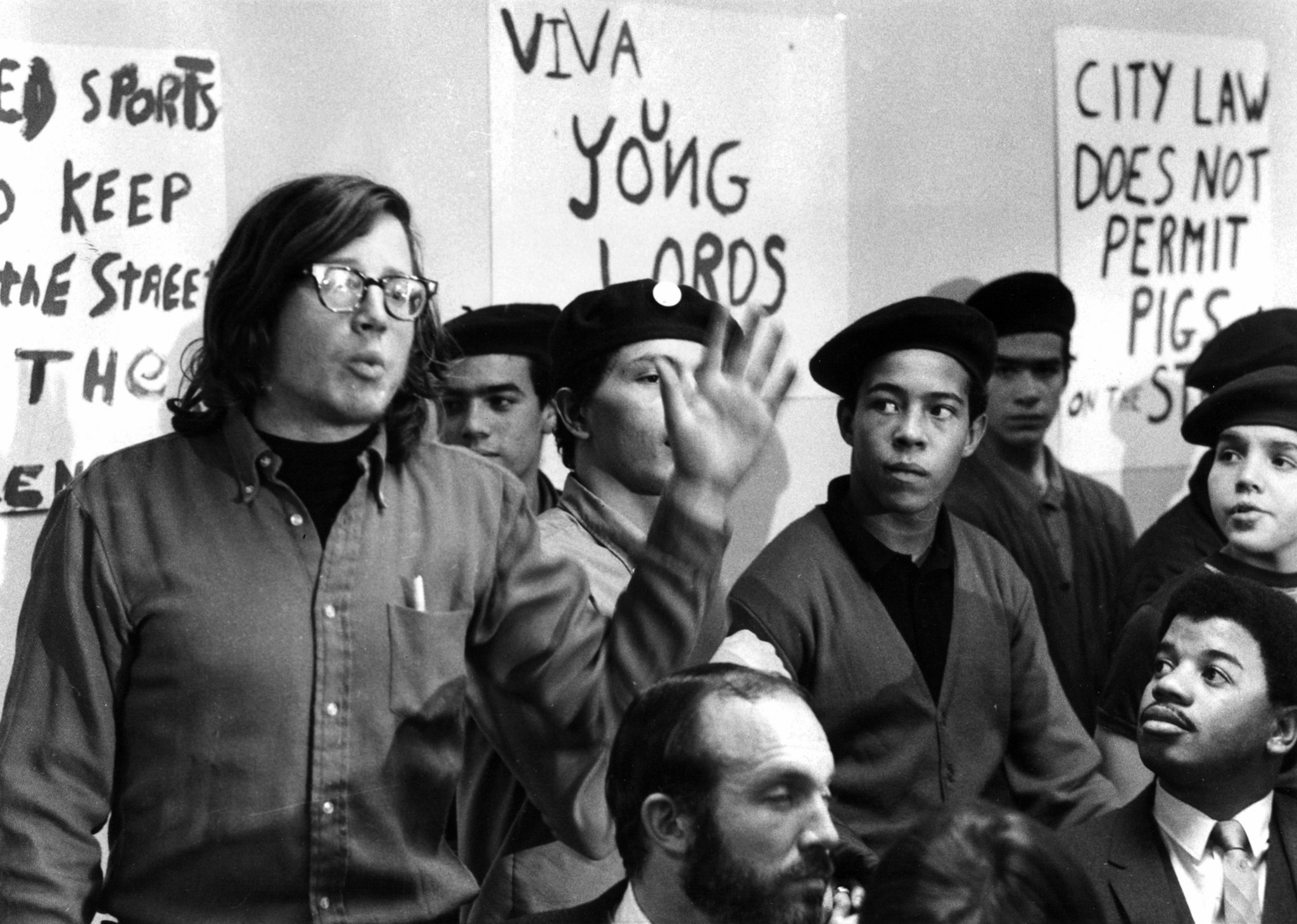 Members of Chicago's Puerto Rican community, including the Young Lords, confront...