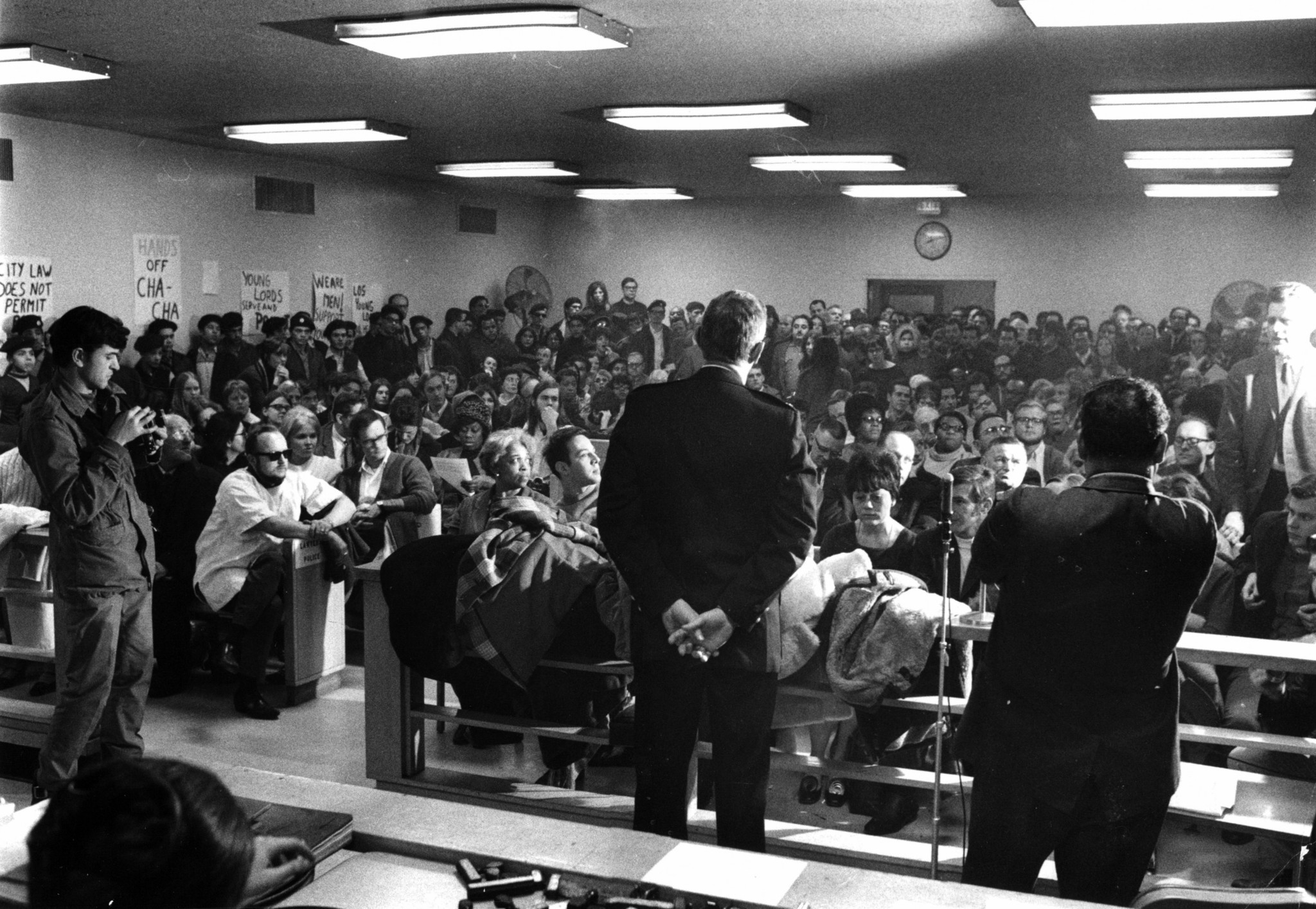 Members of Chicago's Puerto Rican community confront the commander of the...