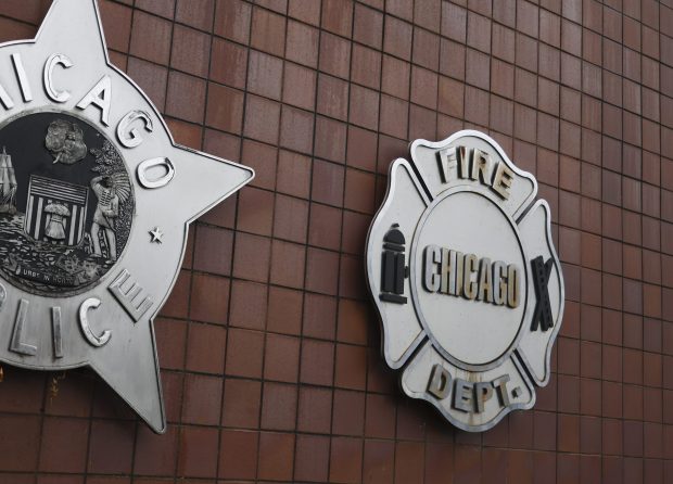 The Chicago Police Department and Chicago Fire Department logos on the outside of Chicago Public Safety Headquarters in 2023. (Talia Sprague/Chicago Tribune)