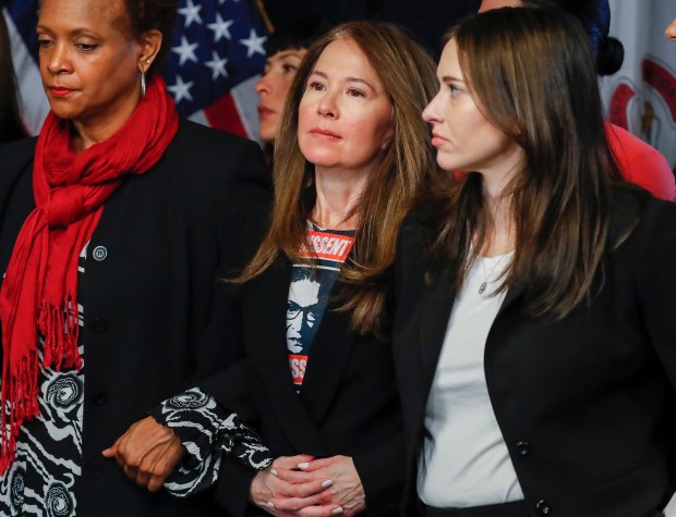 Illinois State Rep. Jennifer Gong-Gershowitz, center, has introduced a bill which prohibits the use of AI to create child pornography and makes it a felony for violators to be caught with the fake images. (José M. Osorio/ Chicago Tribune)