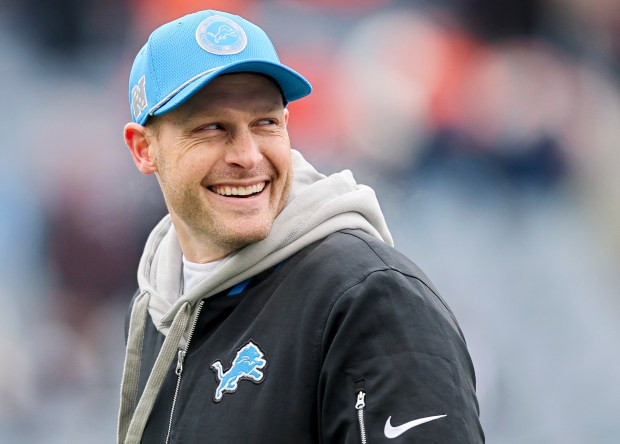 Lions offensive coordinator Ben Johnson smiles before the game against the Chicago Bears at Soldier Field on Dec. 22, 2024. (Michael Reaves/Getty)