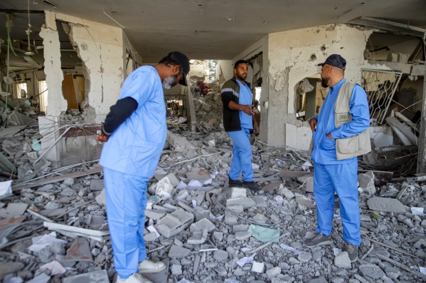 Palestinian medics inspect the damage of Al Najjar hospital that was destroyed by Israeli airstrikes on Rafah, as a ceasefire deal between Israel and Hamas went into effect, Gaza Strip on an. 19, 2025. (Jehad Alshrafi/AP)