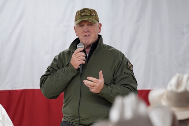 Incoming U.S. Border Czar Tom Homan talks to state troopers and national guardsmen taking part in Operation Lone Star at a facility on the U.S.-Mexico border on Nov. 26, 2024, in Eagle Pass, Texas. (Eric Gay/AP)