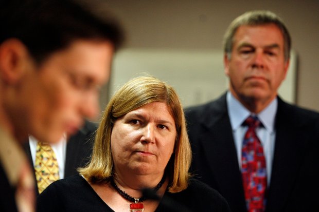 Mary Gade, then EPA regional administrator for region 5, listens as Sadhu Johnston, left, chief environmental officer for the City of Chicago, addresses reporters on Aug. 15, 2007. The group gathered after the Lake Michigan Summit on the BP Whiting refinery. (Zbigniew Bzdak/Chicago Tribune)