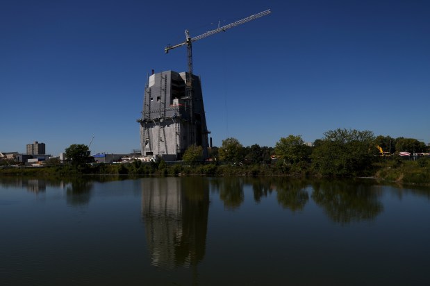 The Obama Presidential Center is reflected in the West Lagoon in Jackson Park on Sept. 4, 2024. (Eileen T. Meslar/Chicago Tribune)