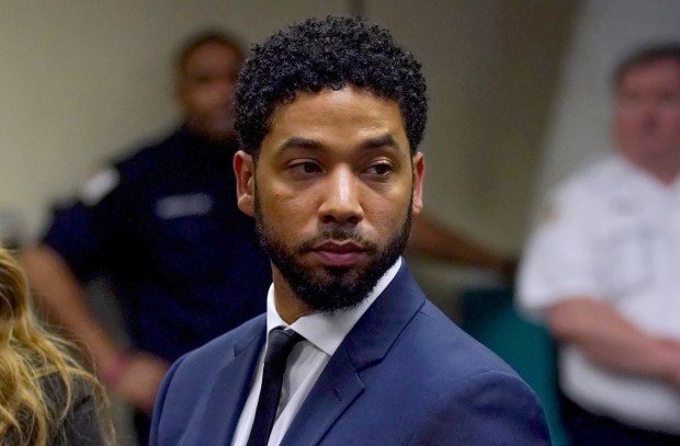 TV actor Jussie Smollett stands before Cook County Circuit Judge Steven Watkins on March 14, 2019, at the Leighton Criminal Court Building in Chicago, where he pled not guilty. (E. Jason Wambsgans/Chicago Tribune)