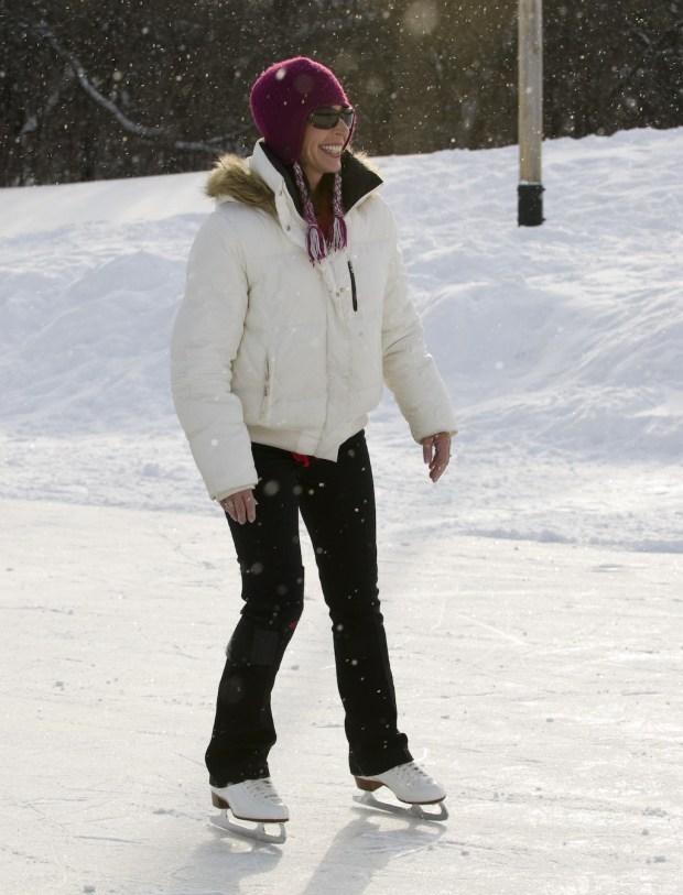 A woman takes a break on the Lakewood Forest Preserve rink in Wauconda. (Photo courtesy of Lake County Forest Preserves District)