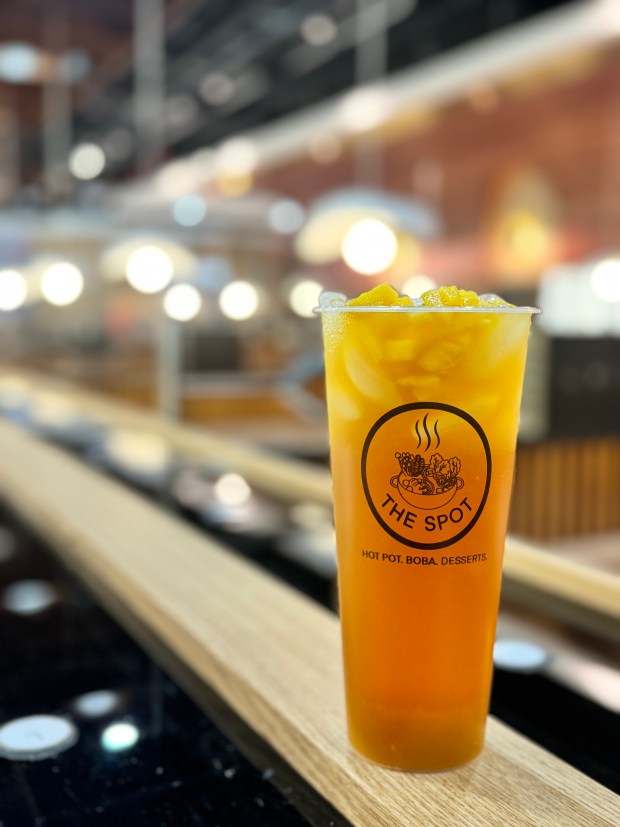 The Mango Green Tea drink from The Spot Rotary Hot Pot restaurant soon to open in downtown Skokie. (The Spot Rotary Hot Pot)