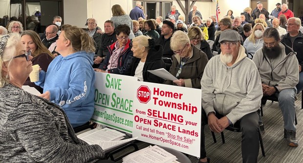 Residents pack the Homer Township Board meeting Oct. 16, 2022, to speak out against plans to sell two parcels of farm land purchased decades ago as open space. The board voted to sell one of the two farms. (Michelle Mullins/for the Daily Southtown)