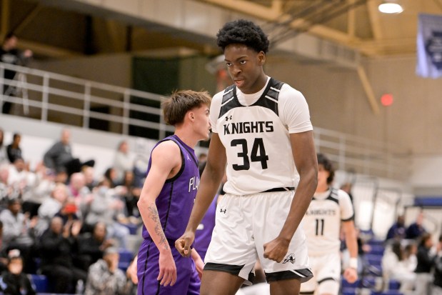 Kaneland's Jeffrey Hassan (34) celebrates during a the Class 3A IMSA Regional semifinals against Plano in Aurora on Wednesday, Feb. 26, 2025. (Mark Black / for the Beacon-News)