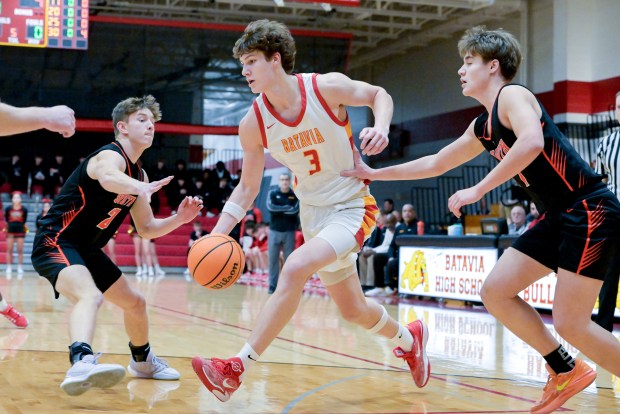 Batavia's Jax Abalos (3) drives toward the basket during a game against Wheaton-Warrenville South at home on Tuesday, Jan. 7, 2025. (Mark Black / for the Beacon-News)