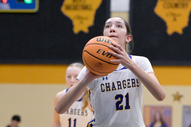 Aurora Central's Sofia Orozco (21) shoots a free throw against Byron during the Class 2A Regional final in Aurora on Friday, Feb. 21, 2025. (Mark Black / for the Beacon-News)