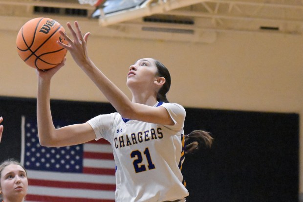 Aurora Central's Sofia Orozco (21) takes a shot against Byron during the Class 2A Regional final in Aurora on Friday, Feb. 21, 2025. (Mark Black / for the Beacon-News)