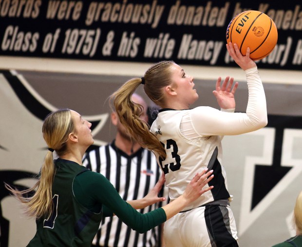 Kaneland's Kendra Brown (23) puts up a shot in front of Bartlett's Alaina Kirk (1) during a non-conference game in the third quarter in Maple Park on Monday, Feb. 3, 2025.H. Rick Bamman / For the Beacon News