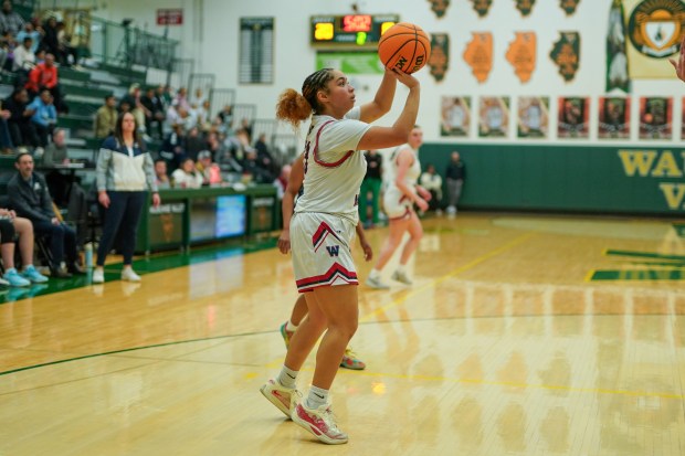 West Aurora's Maya Rabadan (23) shoots the ball on the wing against Downers Grove South during a Class 4A Waubonsie Valley Regional semifinal basketball game at Waubonsie Valley High School in Aurora on Monday, Feb. 17, 2025. (Sean King / for The Beacon-News)