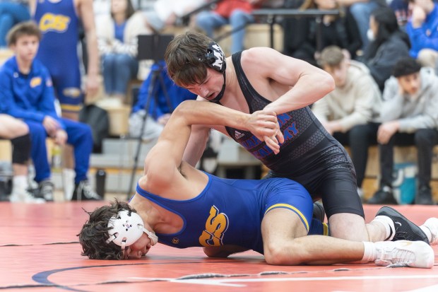 Marmion 157 pounder Ashton Hobson wrestles Sandburg's Vince Gutierrez during the Class 3A Yorkville Dual Team Sectional in Yorkville on Tuesday, Feb. 25, 2025. (Troy Stolt / for the Beacon News)