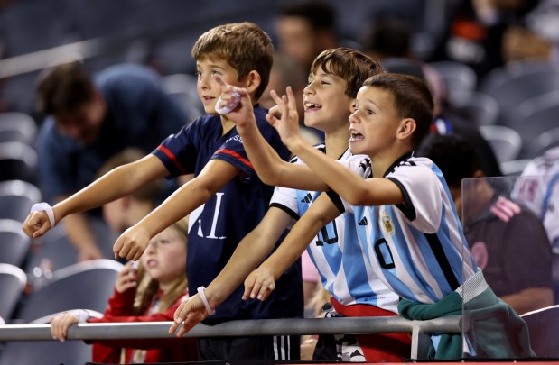 Young fans watch a match between Inter Miami and Chicago Fire at Soldier Field in Chicago on Oct. 4, 2023. (Chris Sweda/Chicago Tribune)