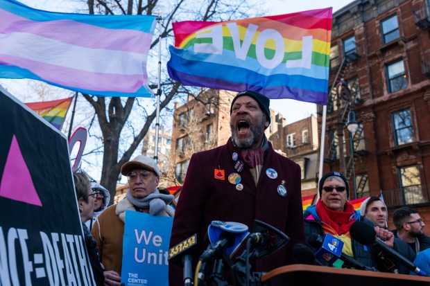 People protest the removal of the word "transgender" from the Stonewall National Monument website during a rally outside of The Stonewall Inn on Feb. 14, 2025 in New York City. The National Park Service eliminated references to transgender people from its Stonewall National Monument website on Thursday and now only refers to those who are lesbian, gay and bisexual. Located in New York City's Greenwich Village neighborhood, the Stonewall Inn became a national monument in 2016 under former President Barack Obama, and was the country's first national park site dedicated to LGBTQ+ history. (Spencer Platt/Getty)