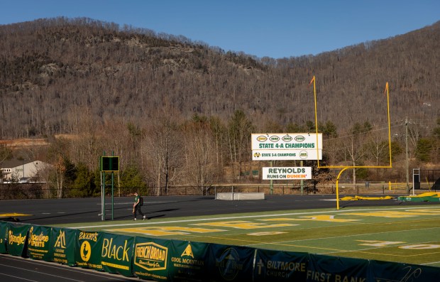 A sign at the A.C. Reynolds High School football stadium in Asheville, N.C. on Feb. 3, 2025, includes the 2002 state championship won by Bears coach Ben Johnson as the Rockets' quarterback. (Brian Cassella/Chicago Tribune)