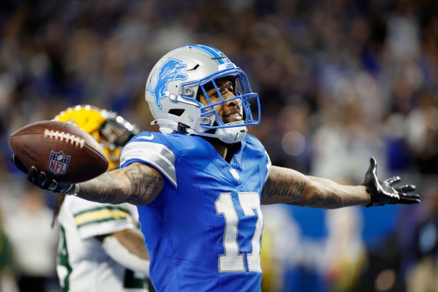 Lions wide receiver Tim Patrick celebrates a touchdown against the Packers on Dec. 5, 2024, in Detroit. (Rick Osentoski/AP)