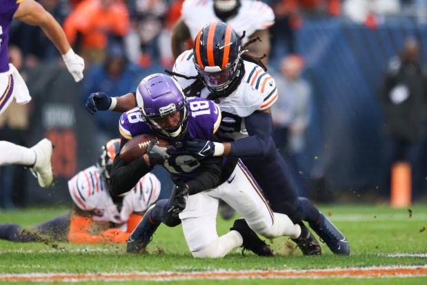 Bears linebacker Tremaine Edmunds tackles Vikings wide receiver Justin Jefferson in overtime Nov. 24, 2024, at Soldier Field. (Eileen T. Meslar/Chicago Tribune)