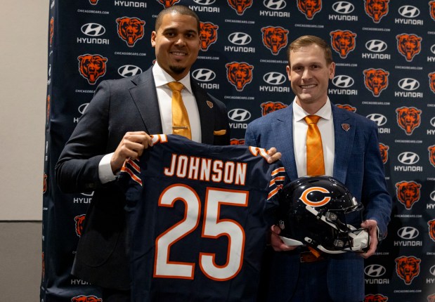 General manager Ryan Poles poses with new Chicago Bears coach Ben Johnson on Wednesday, Jan. 22, 2025, at Halas Hall. (Brian Cassella/Chicago Tribune)