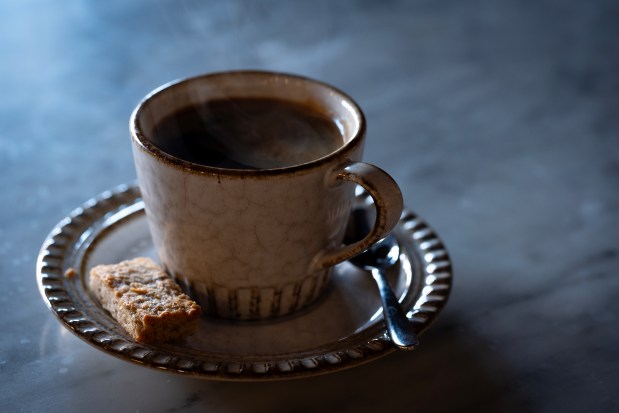 Coffee service with financier at Petite Vie on Feb. 13, 2025. (E. Jason Wambsgans/Chicago Tribune)