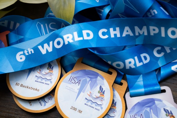 Qing Li's collection of medals from the World Ice Swimming Championships that took place in Molveno, Italy, in January. Li won six medals for her age group, three golds, one silver and one bronze. (Audrey Richardson/Chicago Tribune)