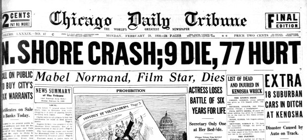 A car wedged between a speeding Chicago, North Shore & Milwaukee passenger train and a freight train in Kenosha caused both trains to derail on Feb. 23, 1930. Twelve people were killed. (Chicago Tribune)