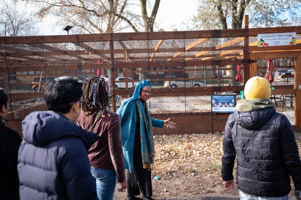 Dr. Constance D. Shabazz, CEO and founder of Salaam Community Wellness Center, hosts participants of the Chicago Black Muslim History Tour at the Woodlawn health center on Dec. 6, 2024. (E. Jason Wambsgans/Chicago Tribune)