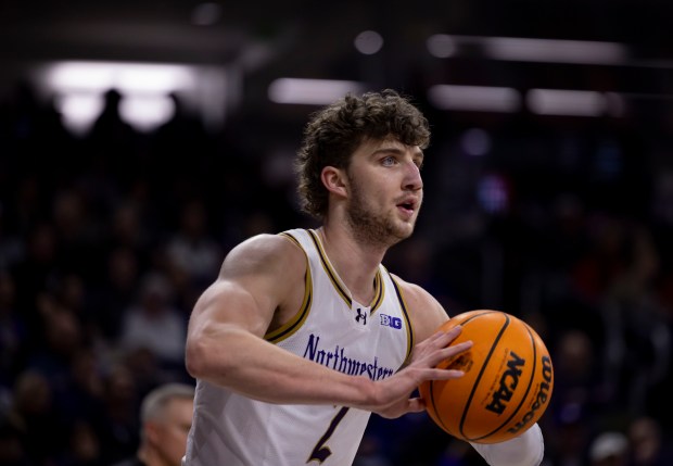 Northwestern forward Nick Martinelli passes against Nebraska in the first half on Feb. 16, 2025, at Welsh-Ryan Arena in Evanston. (Brian Cassella/Chicago Tribune)