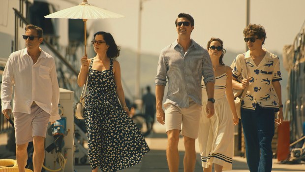 From left: Jason Isaacs, Parker Posey, Patrick Schwarzenegger, Sarah Catherine Hook and Sam Nivola in Season 3 of "The White Lotus." (Fabio Lovino/HBO)