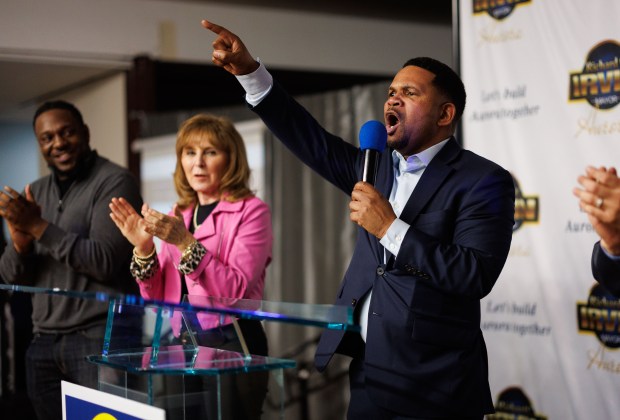 Aurora Mayor Richard Irvin speaks with supporters on stage after it was announced Irvin was leading in the mayoral primary election during an election night party at his headquarters on Feb. 25, 2025, in Aurora. (Armando L. Sanchez/Chicago Tribune)