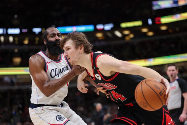 LA Clippers guard James Harden (1) guards Chicago Bulls forward Matas Buzelis (14) during the third quarter at the United Center Wednesday Feb. 26, 2025, in Chicago. (Armando L. Sanchez/Chicago Tribune)