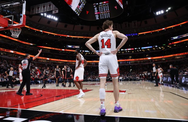 Bulls forward Matas Buzelis stands on the court during a break in the action against the Heat on Feb. 4, 2025, at the United Center. (Chris Sweda/Chicago Tribune)