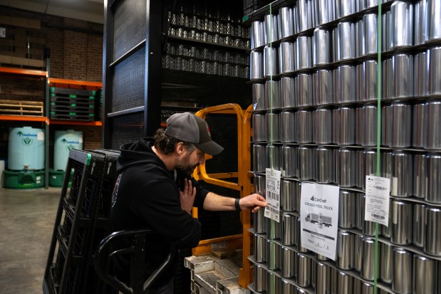 Jason Klein says the 13-year-old brewery uses a half million cans each year, all imported from Canada through a supplier. If the 25% tariffs hit, they will have to raise prices by at least a dollar per six pack to cover the additional cost. (E. Jason Wambsgans/Chicago Tribune)